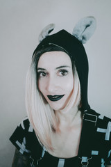 Gothic style portrait of a young woman with cool style