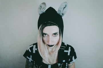 Gothic style portrait of a young woman with cool style