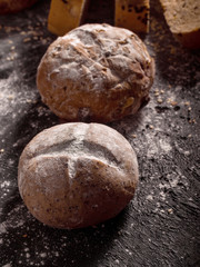 Buns placed on wooden black background