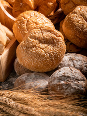 A variety of bread put together in a pile
