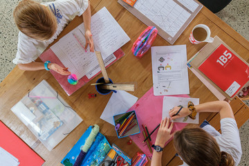 looking down on homeschooling table