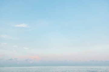 Seascape. Blue horizon background with sky and clouds