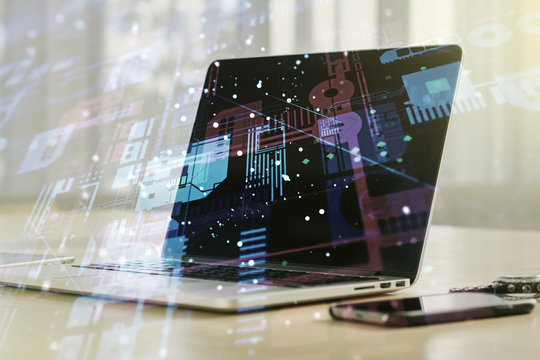 Multi exposure of abstract software development hologram on laptop background, research and analytics concept