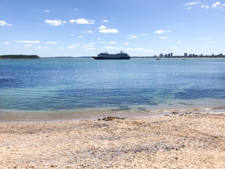 Luxury Azamara Club Cruises cruiseship or cruise ship liner Azamara Pursuit anchors at sea with...