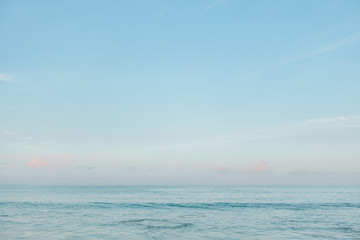 Seascape. Blue horizon background with sky and clouds