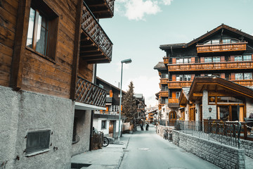 Landscape Scenery View Old Town Valley of Zermatt City, Switzerland. Cityscape Scenic of Traditional Architecture of Swiss Culture Against Mountain Alps. Travel Destination and Europe Vacation. - obrazy, fototapety, plakaty