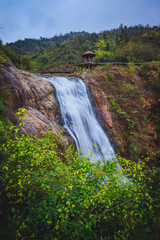 Traditional ancient village with waterfull in Zhejiang Province China