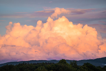 Fluffy puffy soft cumulus cloudscape high in heaven air atmosphere