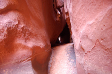 Play of light and shadow in a slot canyon in the North wash canyon country of Southern Utah.