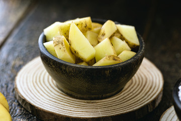 Pieces of sliced ​​potato, rustic and organic.