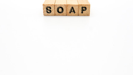 Wooden Text Block of "SOAP" on Isolated Background