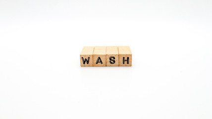 Wooden Text Block of "WASH" on Isolated Background