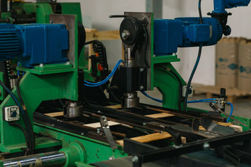 conveyor for the production of wooden boxes for storing fruits and vegetables. woodworking factory for the production of boxes. wooden box making machine