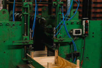 conveyor for the production of wooden boxes for storing fruits and vegetables. woodworking factory...
