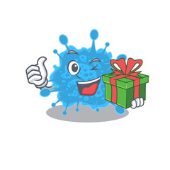 Smiling andecovirus cartoon character having a green gift box