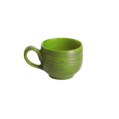 Small green clay cup for hot drinks.