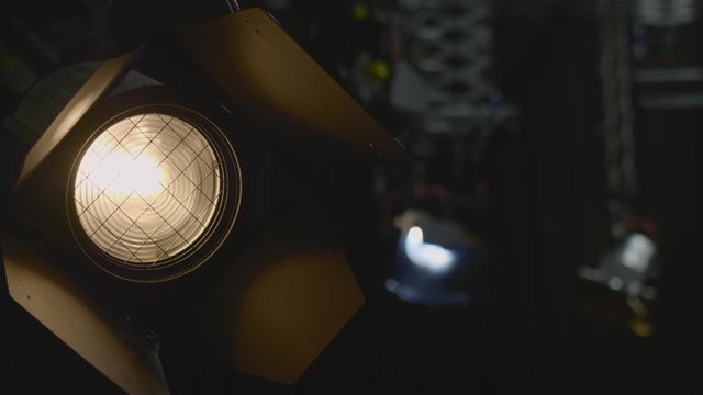 Turning On The Light  Of The Barndoor Lighting Along With The Other Backlights. -close up shot