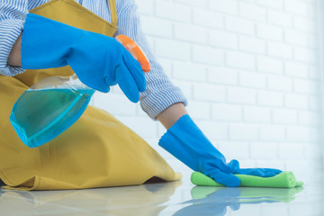 The cleaning staff use cloths on the surface and use cleaning agents containing ingredients to kill disease and viruses.