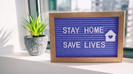 COVID-19 Coronavirus STAY HOME SAVE LIVES viral social media message sign with text for social distancing awareness. COVID-19 staying at home concept. Flatten the curve.