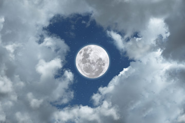 Naklejka na ściany i meble Full moon with blurred white cloud on blue sky.