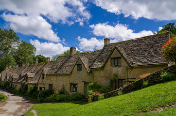 Rows of traditional cottages in the small historic town of Bibury in England