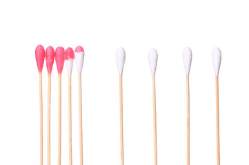 Social Distancing concept staying physically apart for infection control using red cotton bud sticks as a metaphor for containing corona virus outbreak - health and medical concept image .