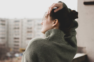 girl on the balcony resting during self-isolation and quarantine