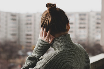 girl on the balcony resting during self-isolation and quarantine