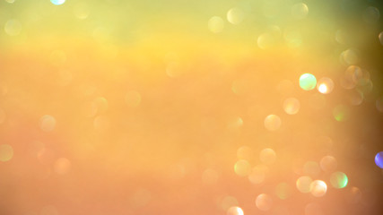 Soft focus, light bokeh on orange background.