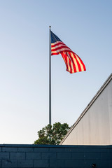 american flag on a building