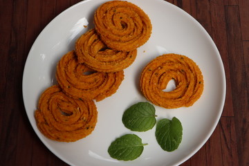 Chakali, murukoo, spiral maharashtrian snack made with gram flour