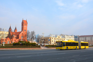 Fototapeta na wymiar MINSK, BELARUS - MARCH 29 2020: Red Church or Church Of Saints Simon and Helen at independence Square in Minsk, Belarus