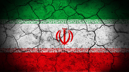 Iran flag on the cracked background texture. 