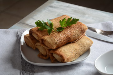 Cabbage rolls stuffed with ground beef and rice in tomato sauce