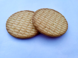fresh healthy sweet eatable biscuit isolated on light blue background