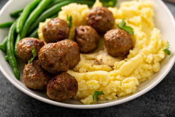 Swedish meatballs with mashed potatoes and green beans