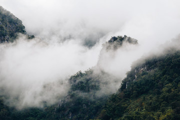 A landscape with fog and the nice view of mountains and forest at Chiang Dao, Thailand