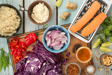 Ingredients for cooking Thai quinoa salad with ginger peanut butter dressing.
