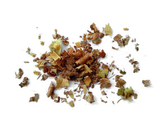 Wood sawdust on white background. Pile of wood shavings and wood powder isolated on white background.