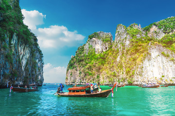 Naklejka na ściany i meble Beautiful scenic landscape of Pileh lagoon with boat for traveler, Phi Phi Leh island Krabi, Famous landmark travel Phuket Thailand, Tourist on summer vacation trips, Tourism destination scenery Asia