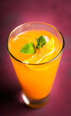 Fresh cocktail with vodka and orange juice on the rustic background. Selective focus. Shallow depth of field.