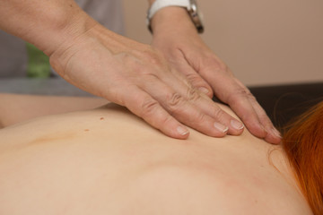 medical therapeutic back massage, relaxation of the back muscles