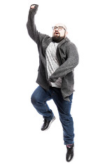 A bald man in glasses emotionally jumps. White background. Vertical.