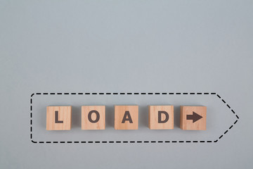 Fototapeta premium Download progress. Success, idea loading. Update program. Almost complete. Wooden cubes, load inscription. Copy space