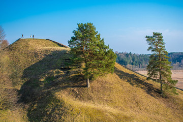 Hills of Kernave, Lithuania, UNESCO world heritage, was a medieval capital of the Grand Duchy of Lithuania, today is a tourist attraction and an archaeological site. Panorama of valley and mounds
