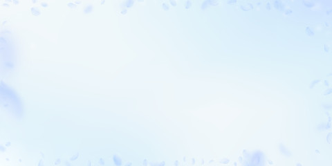 Light blue flower petals falling down. Bizarre rom