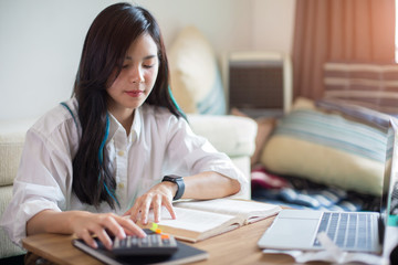 Asian woman Currently working at home 