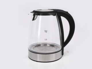 Glass electric kettle on a white background