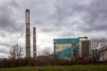 Fototapeta na wymiar Factory with industrial chimney. Industry concept image.