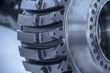 Jet engine gear wheels, industrial background.